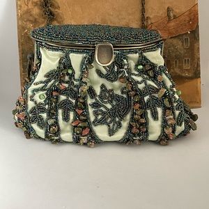 👜Vintage A gorgeous light green purse with a satin look and feel